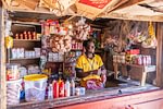 Supermarket kiosk and attendant in Alexandra Township, Johannesburg
